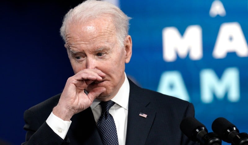 Joe Biden departs after delivering remarks on the supply of semiconductors, in the South Court Auditorium at the White House in Washington on January 21, 2022.