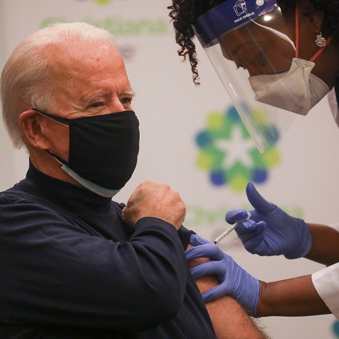 Joe Biden receives a dose of a vaccine against the coronavirus disease (COVID-19) at ChristianaCare Christiana Hospital, in Newark, Delaware, U.S. December 21, 2020. REUTERS/Leah Millis