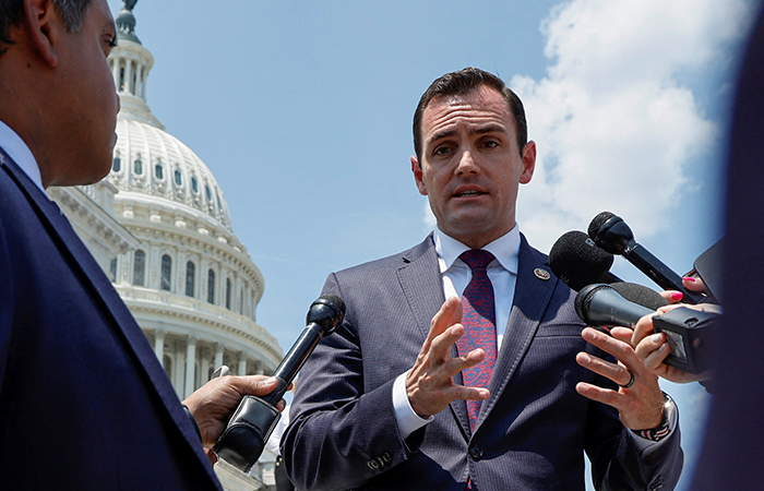 Mike Gallagher (R-WI) speaks to reporters about defense funding at the U.S. Capitol in Washington, U.S. July 12, 2023. REUTERS